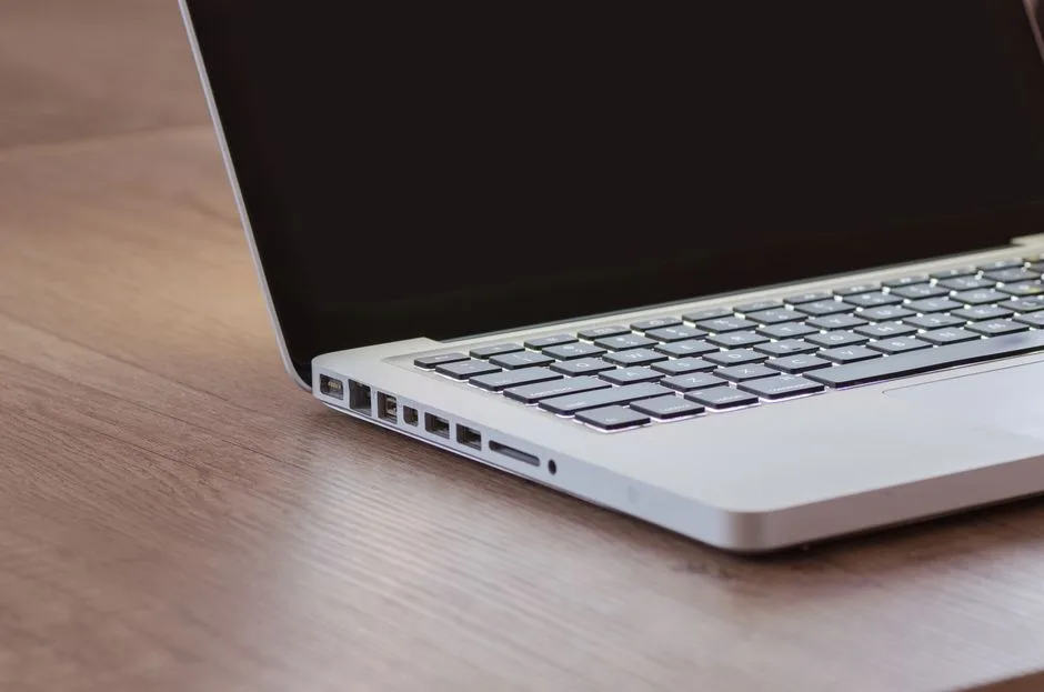 Close-up of a laptop's side ports, representing local network and adapter configuration