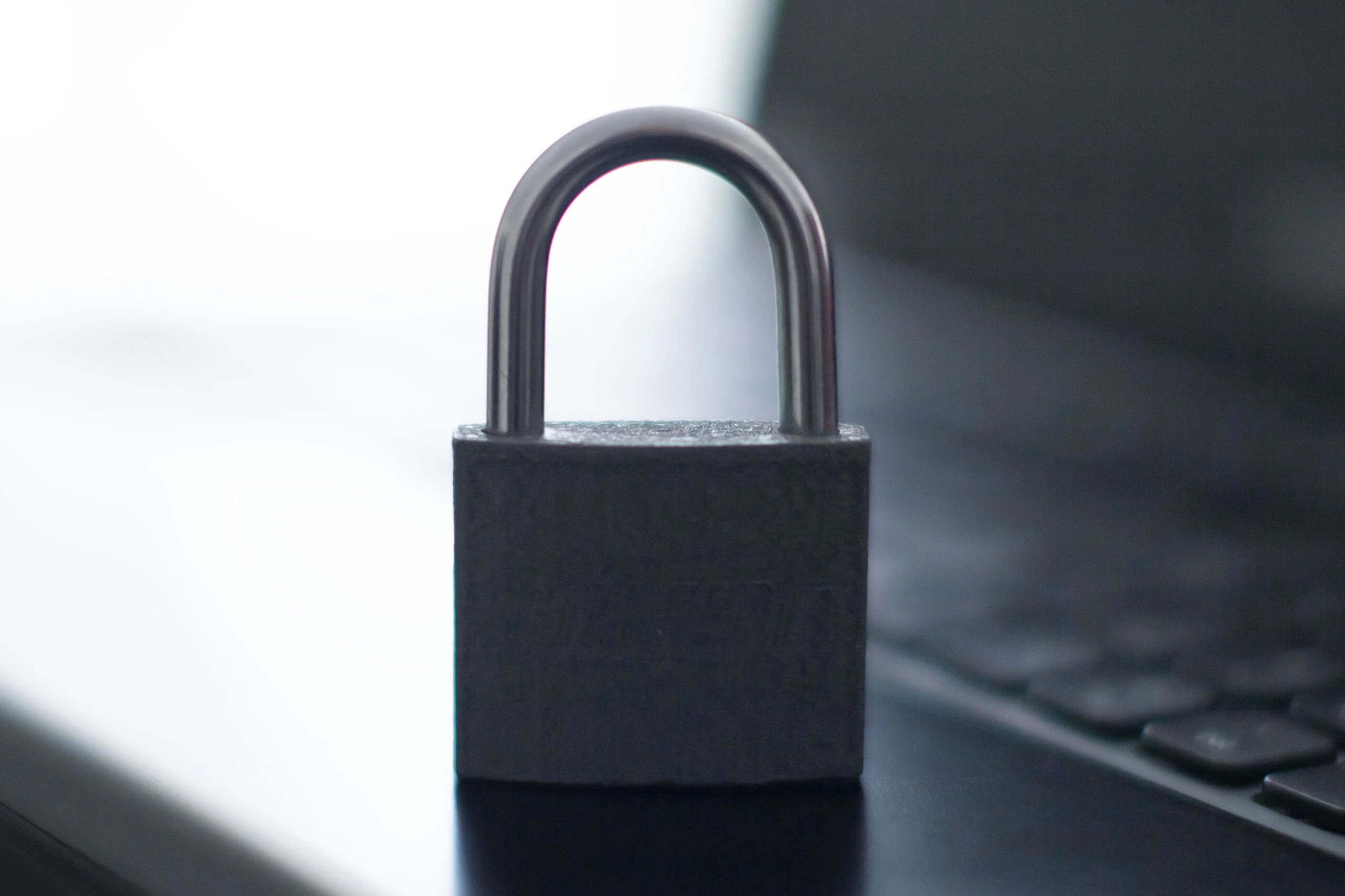 Laptop with a padlock, representing the protection a recommended mac antivirus product should provide