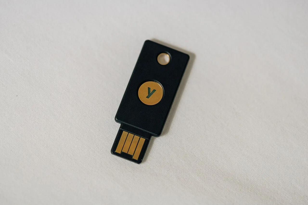 Two-factor authentication guide — a USB hardware security key used for 2FA