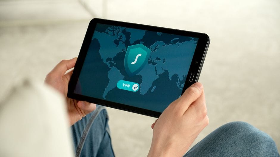 DNS leak test — person checking a VPN connection on a tablet