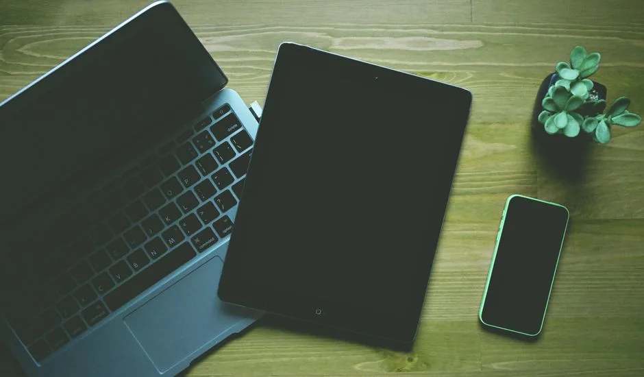 Laptop, tablet, and smartphone side by side, representing VPN use across multiple devices
