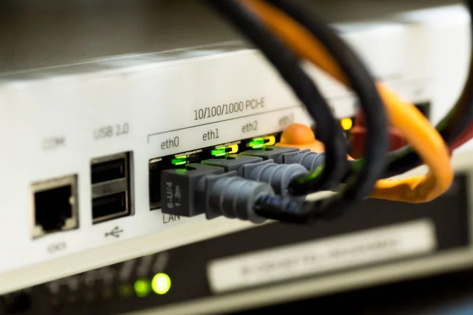 Ethernet cables connected to a router, representing VPN network configuration