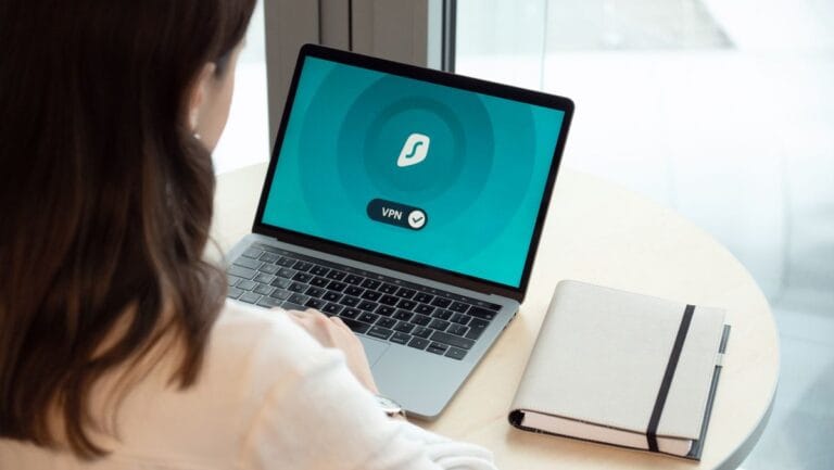 Best VPN for Mac woman using MacBook with VPN app