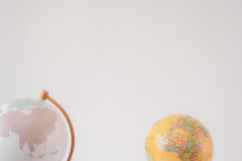 Two world globes side by side, representing VPN region and streaming access